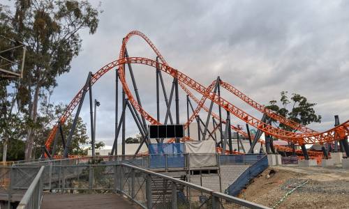Steel Taipan rises over Log Ride rubble at Dreamworld